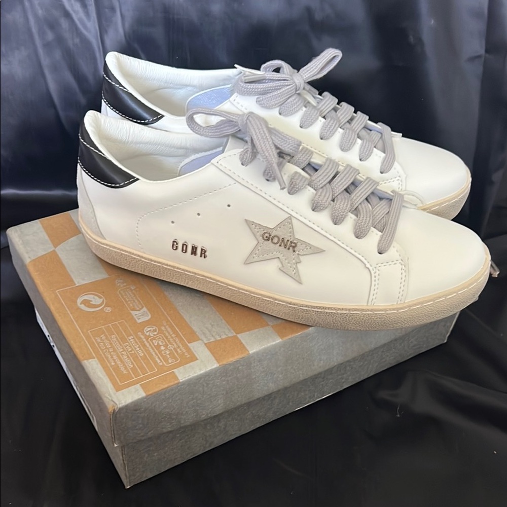 White and Black Distressed Vegan leather Sneakers with Star Logo